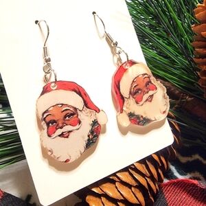 2 pairs of Black Santa earrings